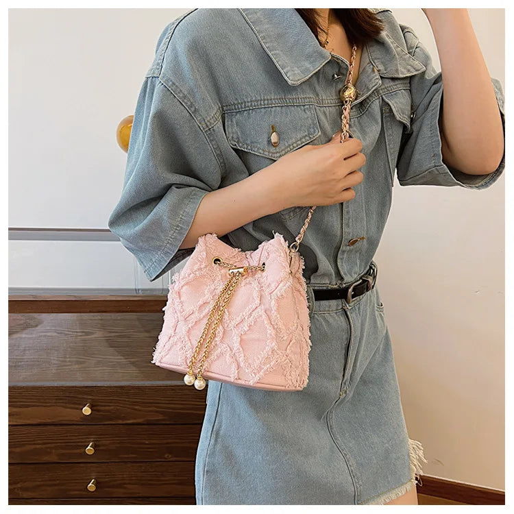 Vintage Denim Bucket Bag Retro Style Light Blue Ripped Edge Design Gold Chain Pearl Embellishment Adjustable Fringe Shoulder Bag