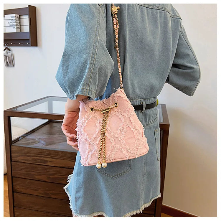 Vintage Denim Bucket Bag Retro Style Light Blue Ripped Edge Design Gold Chain Pearl Embellishment Adjustable Fringe Shoulder Bag