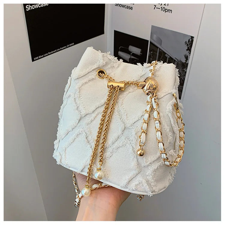 Vintage Denim Bucket Bag Retro Style Light Blue Ripped Edge Design Gold Chain Pearl Embellishment Adjustable Fringe Shoulder Bag