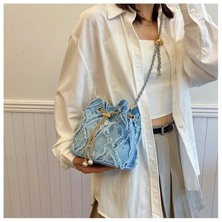 Vintage Denim Bucket Bag Retro Style Light Blue Ripped Edge Design Gold Chain Pearl Embellishment Adjustable Fringe Shoulder Bag
