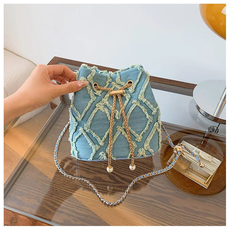 Vintage Denim Bucket Bag Retro Style Light Blue Ripped Edge Design Gold Chain Pearl Embellishment Adjustable Fringe Shoulder Bag
