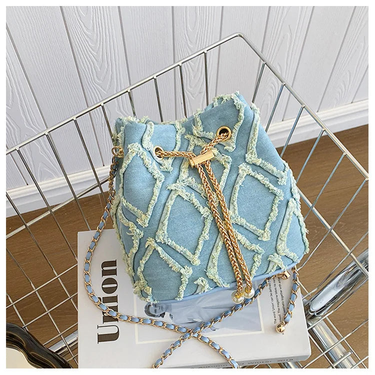 Vintage Denim Bucket Bag Retro Style Light Blue Ripped Edge Design Gold Chain Pearl Embellishment Adjustable Fringe Shoulder Bag