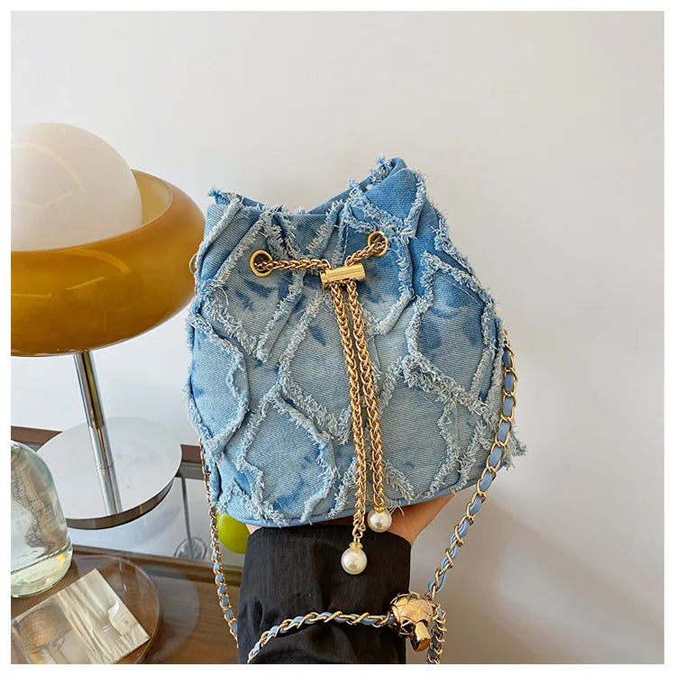 Vintage Denim Bucket Bag Retro Style Light Blue Ripped Edge Design Gold Chain Pearl Embellishment Adjustable Fringe Shoulder Bag