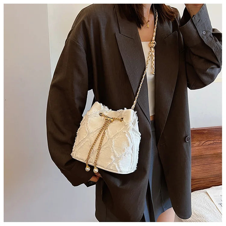 Vintage Denim Bucket Bag Retro Style Light Blue Ripped Edge Design Gold Chain Pearl Embellishment Adjustable Fringe Shoulder Bag