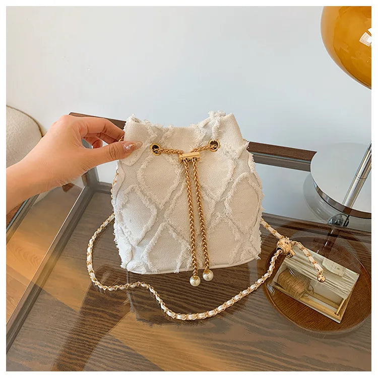 Vintage Denim Bucket Bag Retro Style Light Blue Ripped Edge Design Gold Chain Pearl Embellishment Adjustable Fringe Shoulder Bag