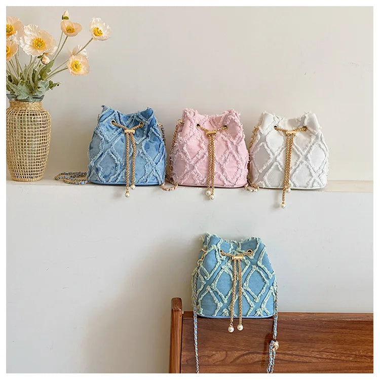 Vintage Denim Bucket Bag Retro Style Light Blue Ripped Edge Design Gold Chain Pearl Embellishment Adjustable Fringe Shoulder Bag