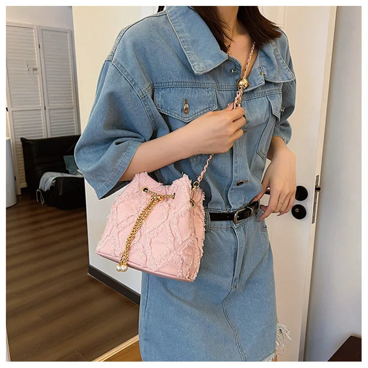 Vintage Denim Bucket Bag Retro Style Light Blue Ripped Edge Design Gold Chain Pearl Embellishment Adjustable Fringe Shoulder Bag