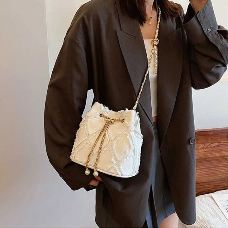 Vintage Denim Bucket Bag Retro Style Light Blue Ripped Edge Design Gold Chain Pearl Embellishment Adjustable Fringe Shoulder Bag
