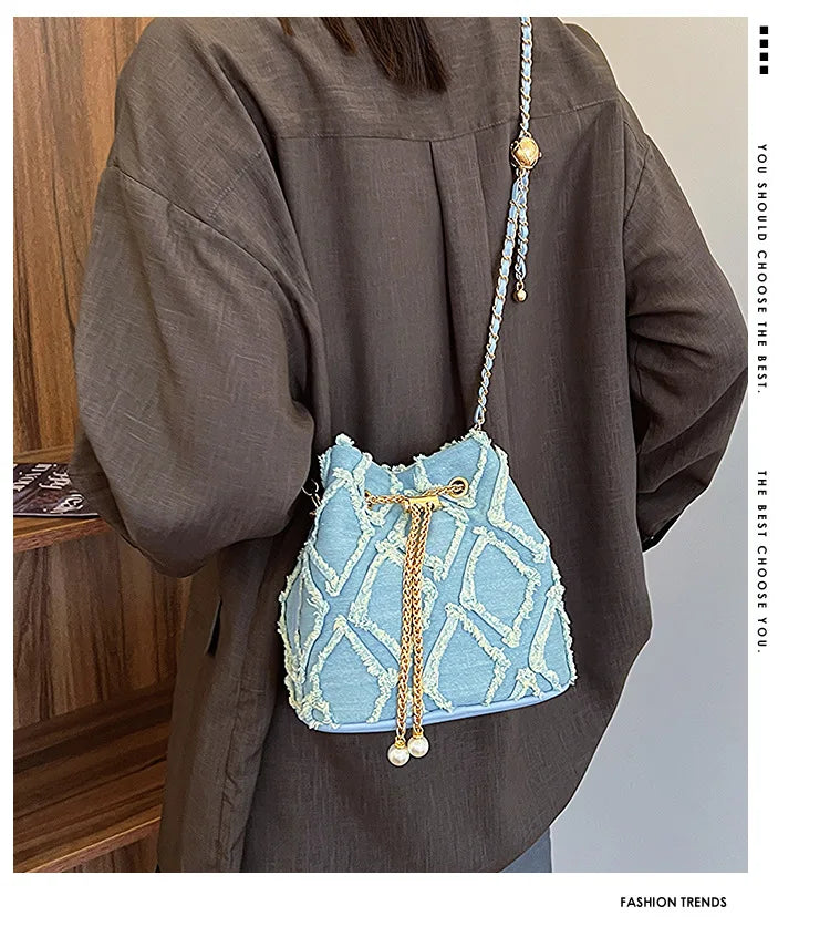 Vintage Denim Bucket Bag Retro Style Light Blue Ripped Edge Design Gold Chain Pearl Embellishment Adjustable Fringe Shoulder Bag