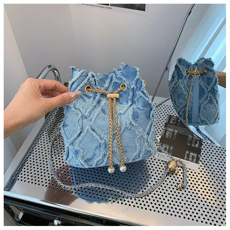 Vintage Denim Bucket Bag Retro Style Light Blue Ripped Edge Design Gold Chain Pearl Embellishment Adjustable Fringe Shoulder Bag
