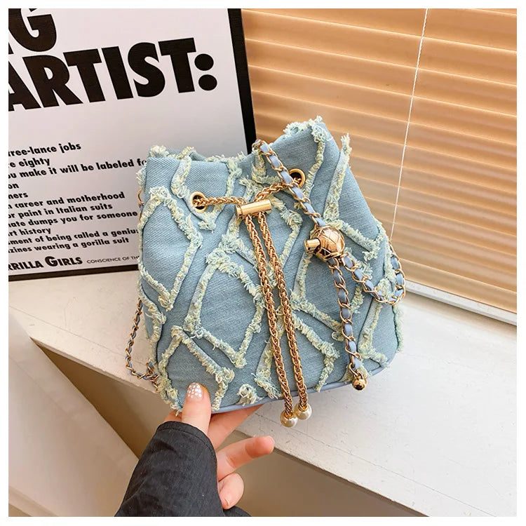 Vintage Denim Bucket Bag Retro Style Light Blue Ripped Edge Design Gold Chain Pearl Embellishment Adjustable Fringe Shoulder Bag