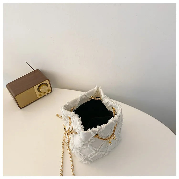 Vintage Denim Bucket Bag Retro Style Light Blue Ripped Edge Design Gold Chain Pearl Embellishment Adjustable Fringe Shoulder Bag