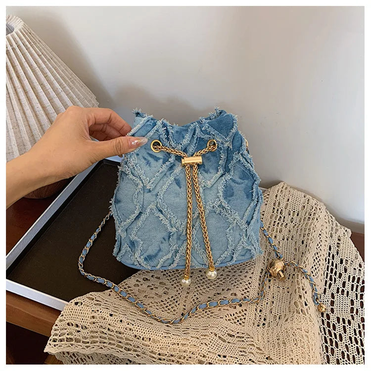 Vintage Denim Bucket Bag Retro Style Light Blue Ripped Edge Design Gold Chain Pearl Embellishment Adjustable Fringe Shoulder Bag