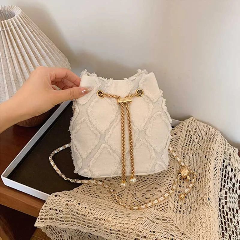 Vintage Denim Bucket Bag Retro Style Light Blue Ripped Edge Design Gold Chain Pearl Embellishment Adjustable Fringe Shoulder Bag
