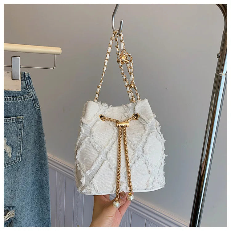 Vintage Denim Bucket Bag Retro Style Light Blue Ripped Edge Design Gold Chain Pearl Embellishment Adjustable Fringe Shoulder Bag