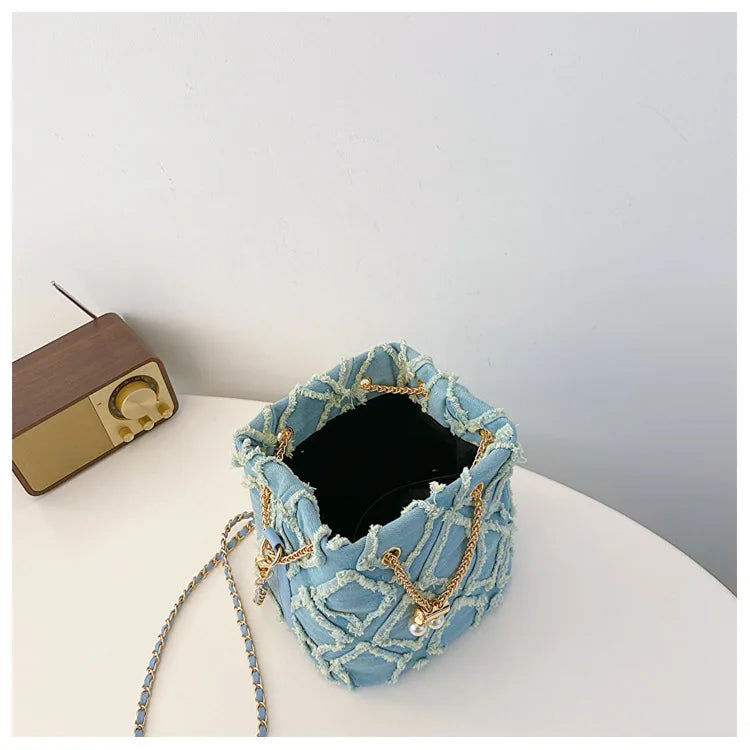 Vintage Denim Bucket Bag Retro Style Light Blue Ripped Edge Design Gold Chain Pearl Embellishment Adjustable Fringe Shoulder Bag