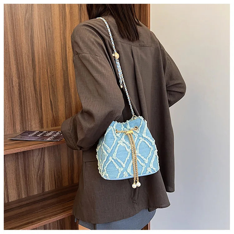 Vintage Denim Bucket Bag Retro Style Light Blue Ripped Edge Design Gold Chain Pearl Embellishment Adjustable Fringe Shoulder Bag