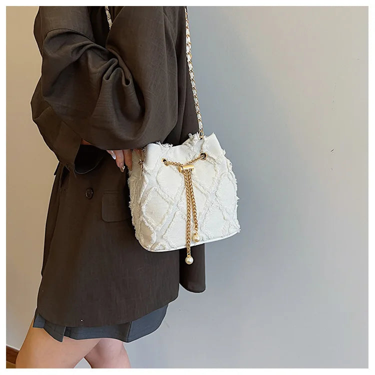 Vintage Denim Bucket Bag Retro Style Light Blue Ripped Edge Design Gold Chain Pearl Embellishment Adjustable Fringe Shoulder Bag