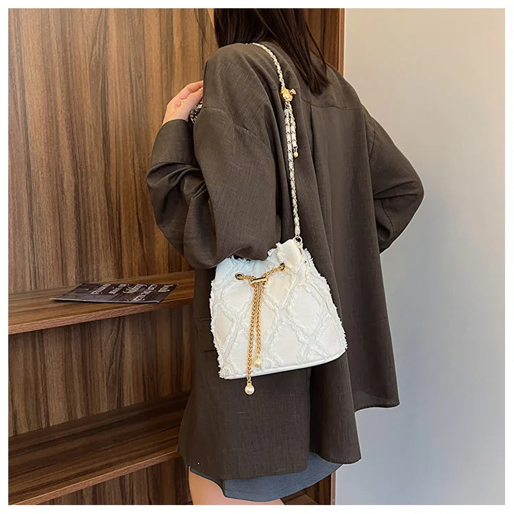 Vintage Denim Bucket Bag Retro Style Light Blue Ripped Edge Design Gold Chain Pearl Embellishment Adjustable Fringe Shoulder Bag
