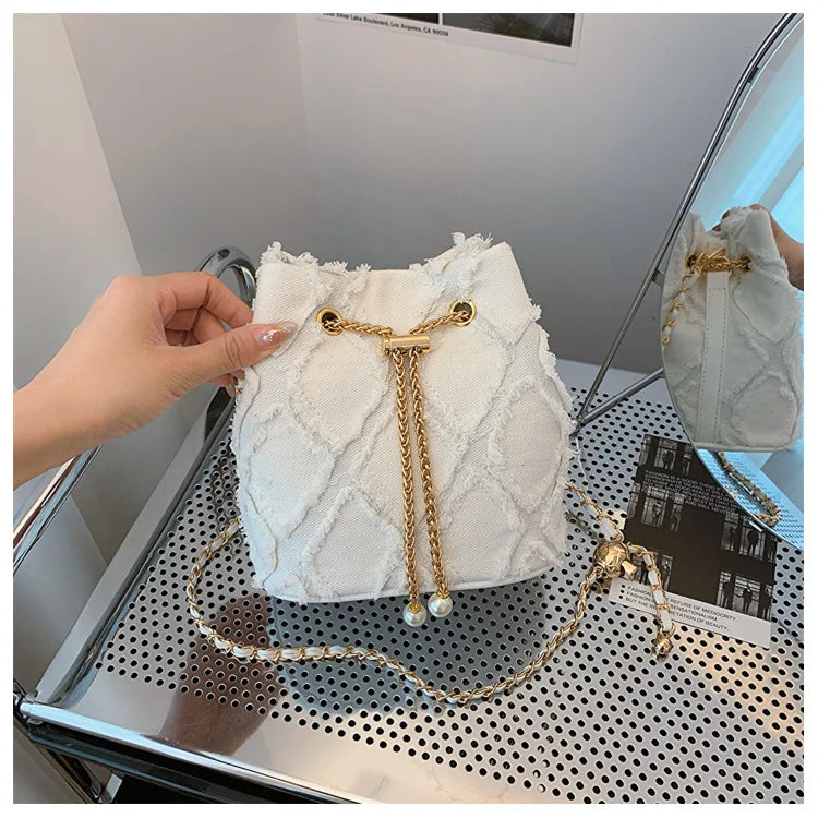 Vintage Denim Bucket Bag Retro Style Light Blue Ripped Edge Design Gold Chain Pearl Embellishment Adjustable Fringe Shoulder Bag