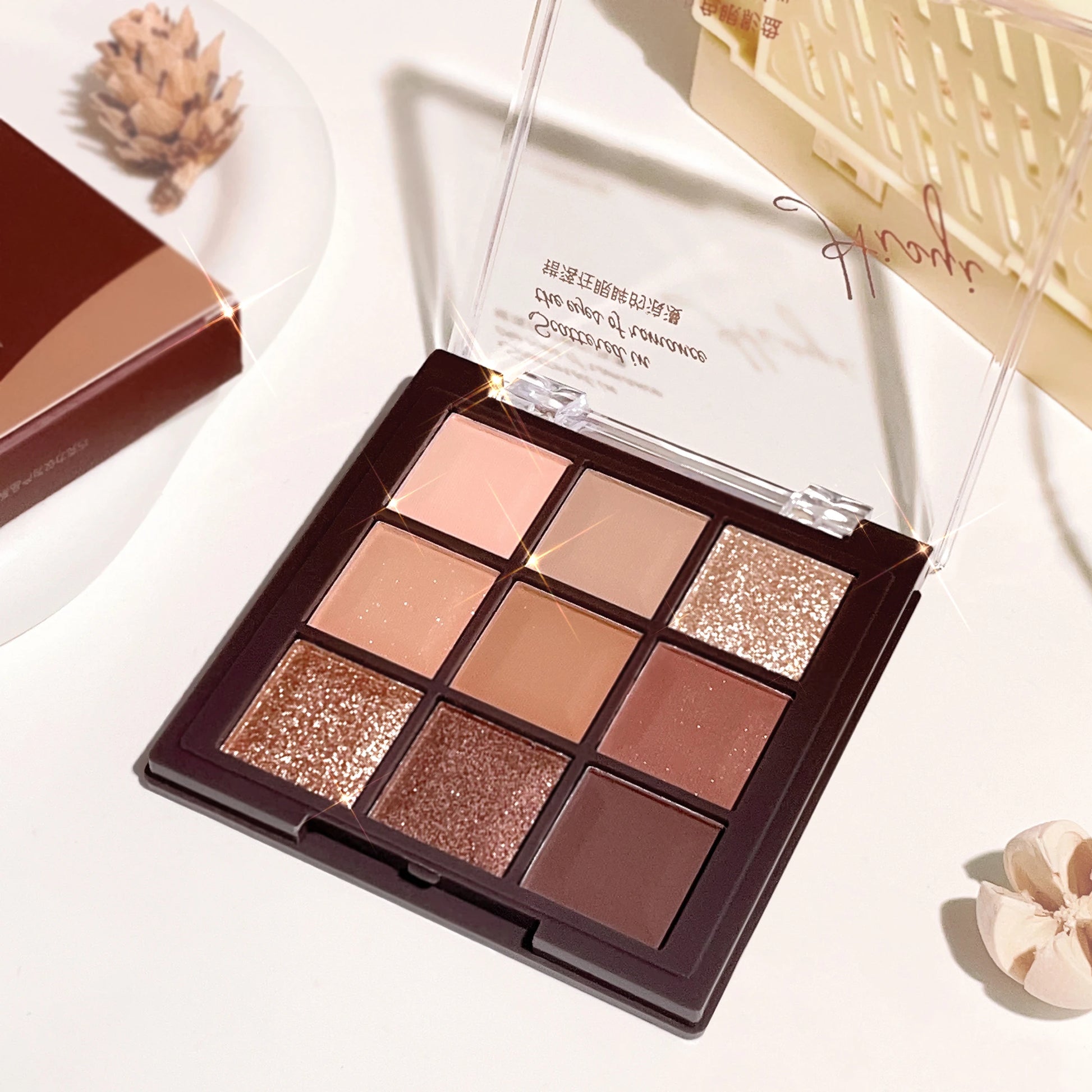 9-Color Chocolate Eyeshadow Palette with Pearl Shine, Fine Glitter, Matte Earth Tones, and Highlighting for Makeup