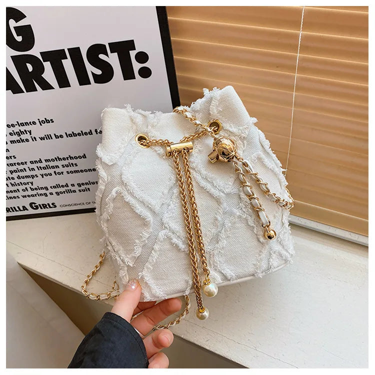 Vintage Denim Bucket Bag Retro Style Light Blue Ripped Edge Design Gold Chain Pearl Embellishment Adjustable Fringe Shoulder Bag